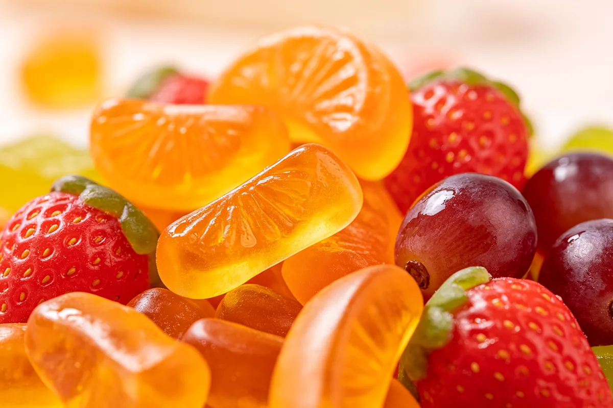 Assorted gummy candies and fruits